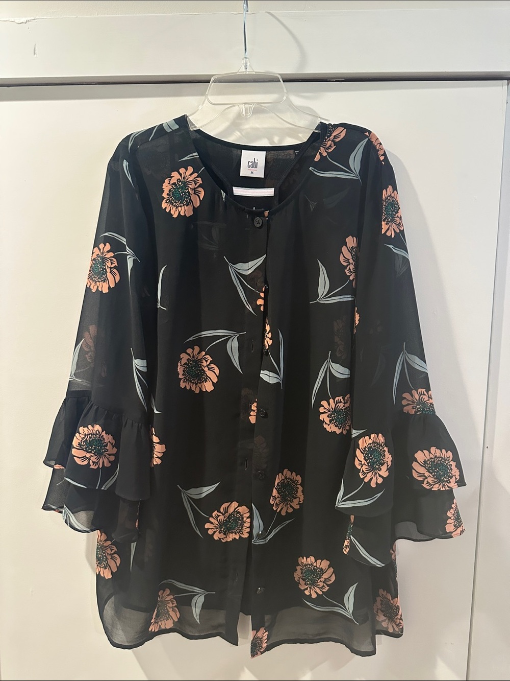CAbi Black Blouse with Peach Floral Print and Ruffle Sleeves